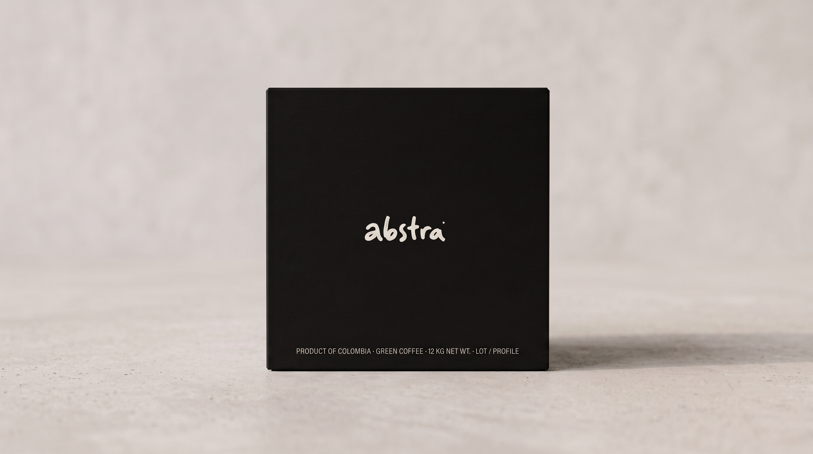 Abstra 12 kg green coffee box, black, photographed straight on